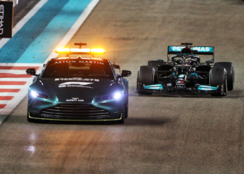 The Aston Martin Vantage safety car leads Lewis Hamilton in the final laps of the 2021 Abu Dhabi Grand Prix