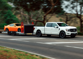 Ford F-150 Platinum towing a Ford Mustang