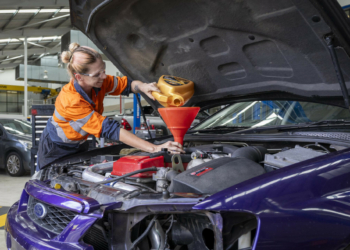 TAFE student working on a Ford Falcon seized by Queensland Police