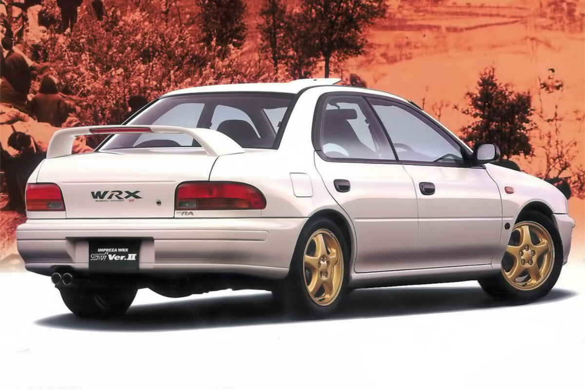 An image of a silver Subaru Impreza WRX in a showroom.