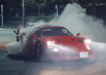 Lewis Hamilton performing donuts in a Ferrari F40 with Kim Kardashian